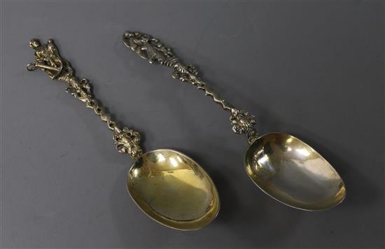 Two Continental figural silver and parcel gilt spoons
